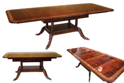 Custom narrow mahogany dining table with self storing leaves. Size, finish and inlays can be modified