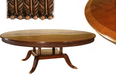 Extra large 84 inch American made mahogany dining room table with feather carved apron and sturdy birdcage pedestal