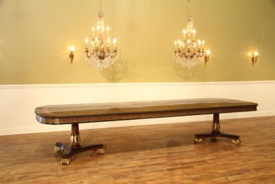 High end American finished gold accented double pedestal table. Seats up to 16 people