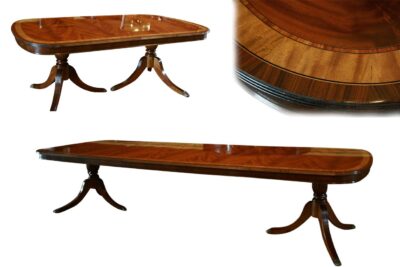 Large dining table seats 12 to 14. Fine high end mahogany dining table fitted with an apron or table skirt