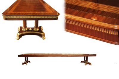Large exclusive designer dining table with carved apron. Seats 14 persons.