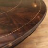 Large round expandable mahogany dining table with matching leaf storage cabinet in our extra dark finish. - Image 16