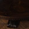 Round rustic dining table with walnut finish and robust base. - Image 11