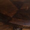 Round rustic dining table with walnut finish and robust base. - Image 10