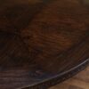 Round rustic dining table with walnut finish and robust base. - Image 9