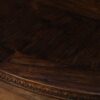 Round rustic dining table with walnut finish and robust base. - Image 8