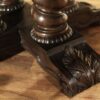 Round rustic dining table with walnut finish and robust base. - Image 2