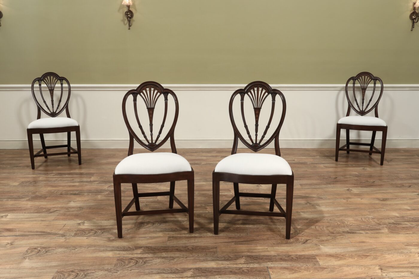 High end inlaid Hepplewhite chairs. Antique style dining chairs in solid mahogany and inlaid bell flowers