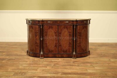 Bowfront sideboard. mahogany, walnut and brass mounted side cabinet. Antique reproduction, Empire original.
