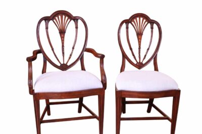 High end inlaid Hepplewhite chairs. Antique style dining chairs in solid mahogany and inlaid bell flowers