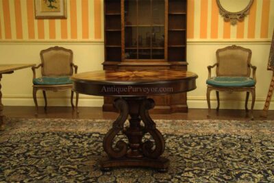 Inlaid entrance way table with satinwood floral inlays.  Regency style pedestal base. Made from mahogany solids and inlaid with exotic Veneers.