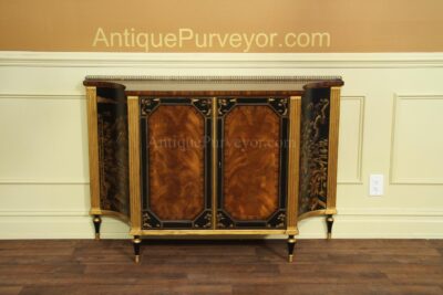 Small black and gold server with Chinoiserie motif. Brass gallery top,gold accented cabinet with Sheraton legs