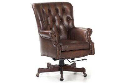 Tufted leather executive chair with brass nail head trim, chair can swivel and tilt