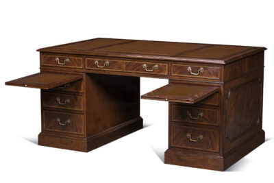 Leather top mahogany executive desk with slide out trays by Theodore Alexander