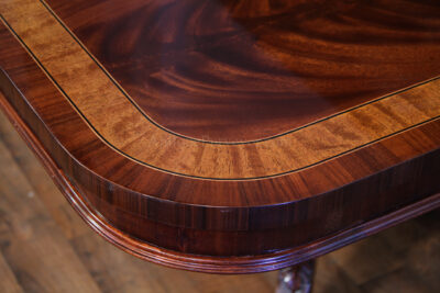 Satinwood banded inlaid mahogany dining table